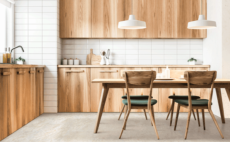 luxury vinyl tile flooring in kitchen with wood cabinetry and white subway backsplash tile